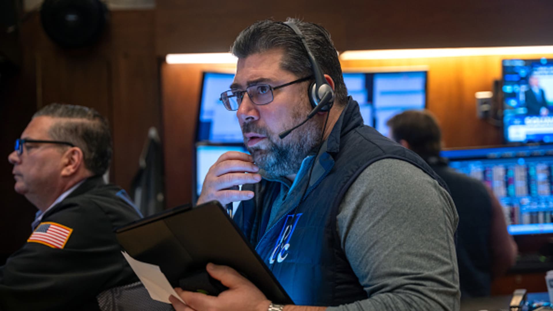 Traders work on the floor during morning trading at the New York Stock Exchange on March 6, 2024.